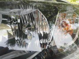 Closeup view of Car Head light with turn signal in it photo