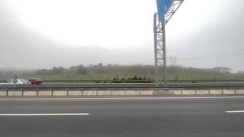 A slow motion of highway view from car window in Turkey cloudy day video