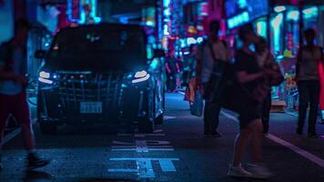 A night timelapse of the neon street at the downtown in Shinjuku Tokyo tiltshift video