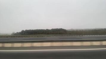 View of highway from car window in Turkey cloudy day video