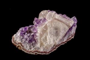 macro mineral amethyst stone with calcite black background photo