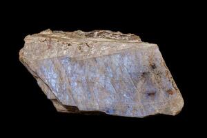 Macro of a stone Moonstone mineral on a black background photo