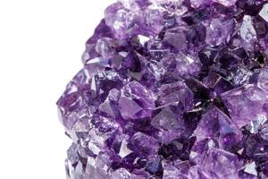 Amethyst Crystal Druse macro mineral on white background photo