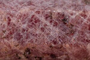 Macro mineral stone Ruby in the breed a white background photo