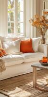 Cream Sofa With Orange Pillows In Living Room photo