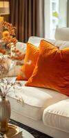 Cream Sofa With Orange Pillows in Living Room photo