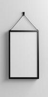 Black Frame Hanging on White Wall photo