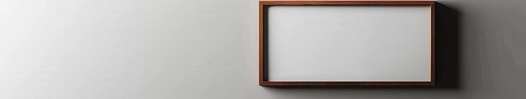 Brown Wooden Frame On Gray Wall photo