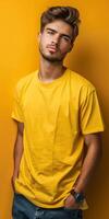 Man in Yellow T-Shirt Against Yellow Background photo