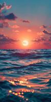 Ocean Sunset With Rippling Waves and Glowing Reflection photo