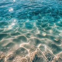 Tranquil Turquoise Water and Sandy Bottom at a Beach Shoreline photo