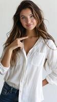 Woman In White Shirt Pointing At Herself photo