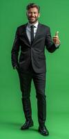 Businessman in Suit Giving Thumbs Up photo