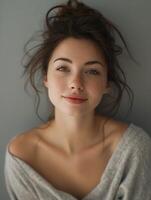 Woman With Freckles and Messy Bun photo