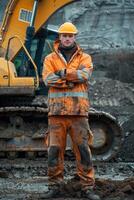 Construction Worker Posing in Front of Excavator photo
