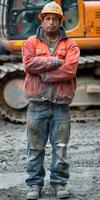 Construction Worker Posing by Excavator photo
