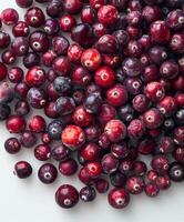 A Pile of Cranberries on a White Table photo