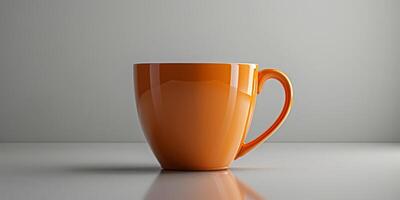 Orange Coffee Cup on Table photo