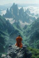 Buddhist Monk Sitting Atop Mountain Peak photo