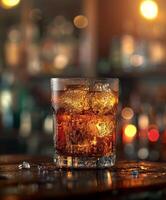 Close Up of a Glass of Alcohol on a Table photo