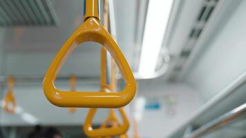 Handrails in a subway , Loop handles on train, Japan. Slow motion. video