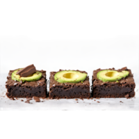 Avocado chocolate brownies fudgy and decadent slicing apart with a dusting of cocoa powder falling png