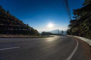 Winding road in the midst of mountain nature on the way to Doi Inthanon. Chiang Mai Province. photo