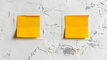 Blank yellow paper taped to the wall for writing messages. photo