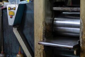 Machine and tool of Computer numerical control CNC, factory creates metal religion art such as Gold rolling machine and little jewelry in religious ceremony. photo