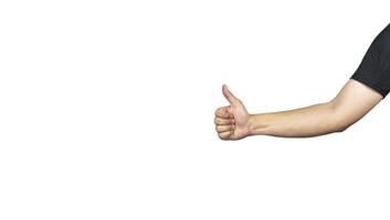 Mysterious hands make his hand into the form of a like button. He is dressed in a black t shirt, with a white background. Clipping Paths. photo