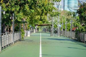 Green sky walk connects between Lumpini Park and Benchakitti Park. This is total distance 1.3 km and is builded in heart of Bangkok city. photo