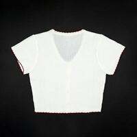 flat White knitwear sweater tshirt shape with red line on the rim on black background in studio light. photo