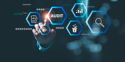 concept of auditing and evaluating quality and efficiency of personnel ,business document evaluation process ,inspection of business finance tax documents ,Data analysis reports growth results photo