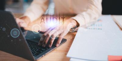 Accountant showing office document auditing concept ,plan review process and assess correctness ,Management of important document storage of organization ,document system ,accountant Audit documents photo