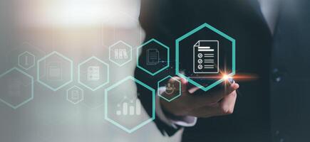 Accountant showing office document auditing concept ,checkboxes Concepts of practices and policies ,company articles of association Terms and Conditions,plan review process and assess correctness photo