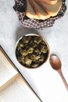 Homemade Grape Leaves Stuffed With Rice and Herbs photo