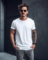 A stylishly dressed man poses confidently with hands in pockets photo