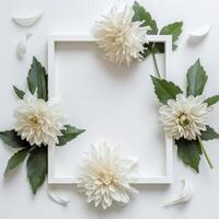 A simple white frame adorned with white flowers and leaves on a white background photo