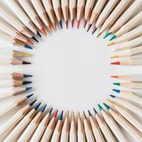A close-up of colored pencils arranged in a circle photo