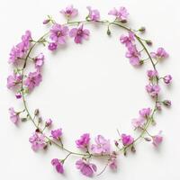 Simple pink flower wreath on white background photo