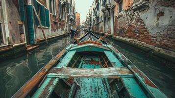 Gondola glides through Venice canals, showcasing historic architecture photo