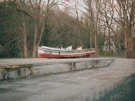 The recovered boat moornixe on a concrete ramp photo