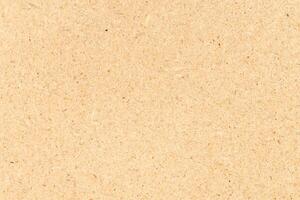 Natural recycled chipboard background texture. Full frame photo