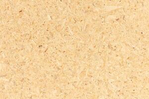 Natural recycled chipboard background texture. Full frame photo