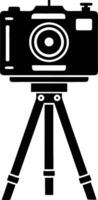 camera stand with camera illustration black and white vector