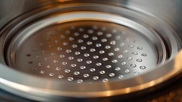 A detailed look at the drip tray on an automatic milk frother designed to catch any spills or drips for easy cleanup video