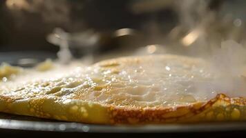 A steam vent can be seen on the edge of the crepe makers surface releasing heat and moisture for evenly cooked crepes video