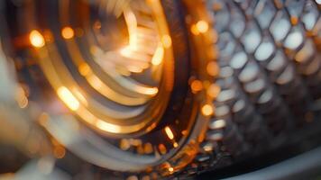 In the second image we see a macro lens in all its glory. The metal exterior is adorned with a delicate embossed pattern while the internal glass elements create an intricate multilayere video