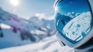 The first image shows a closeup of the ski goggles with the mirrored lens reflecting the snowy mountain landscape in the background video