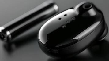 A closeup of the intuitive touch controls on the earbud allowing for easy and convenient adjustments to volume and playback video